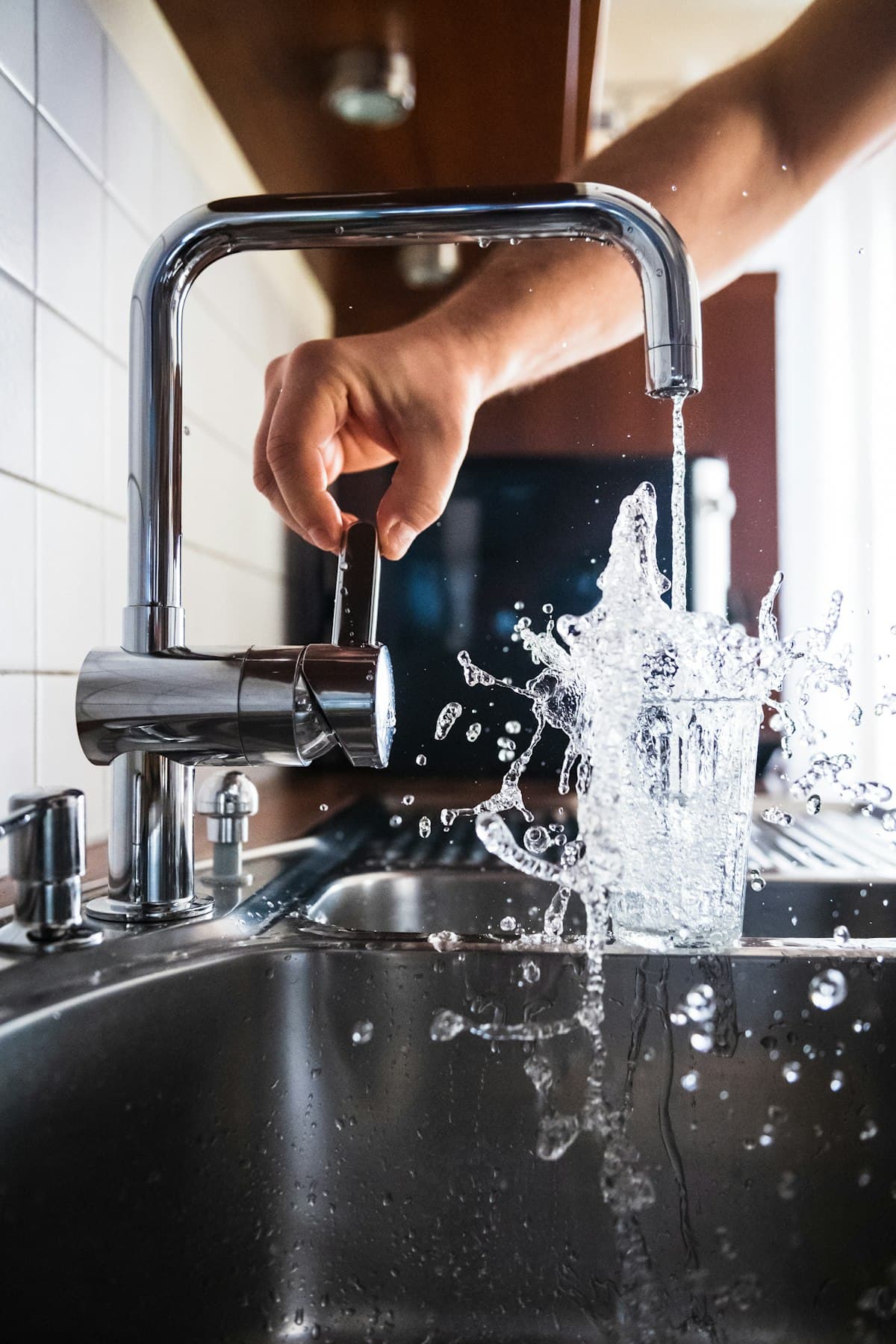 A leaking kitchen faucet — the kind of everyday repair homeowners describe.